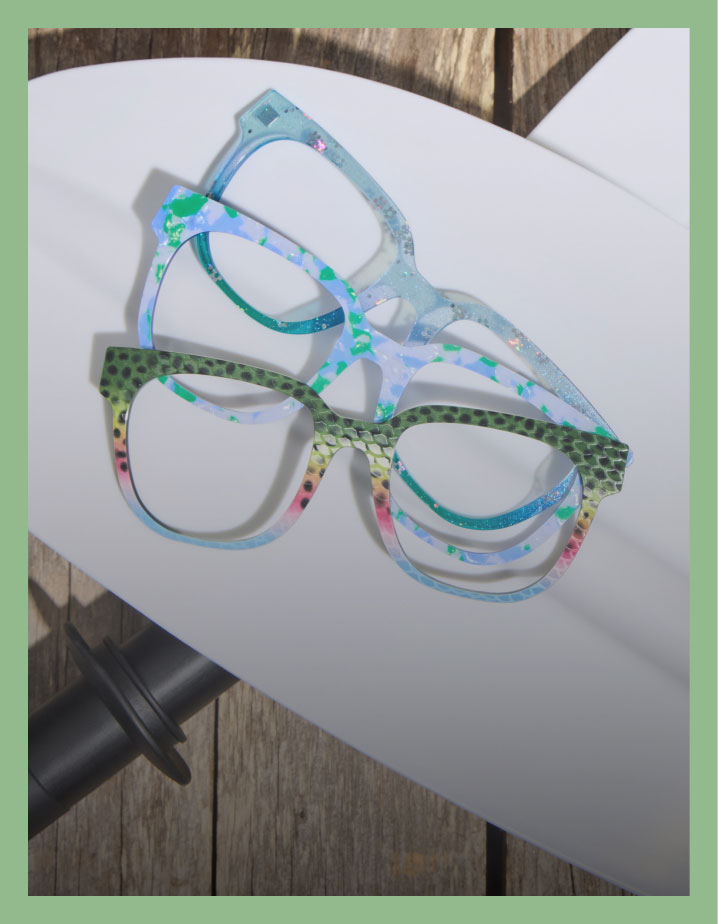 Colorful Pair Eyewear tops arranged on wood